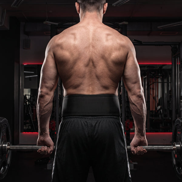 Body Reapers auto-locking belt worn across the lower back at a barbell